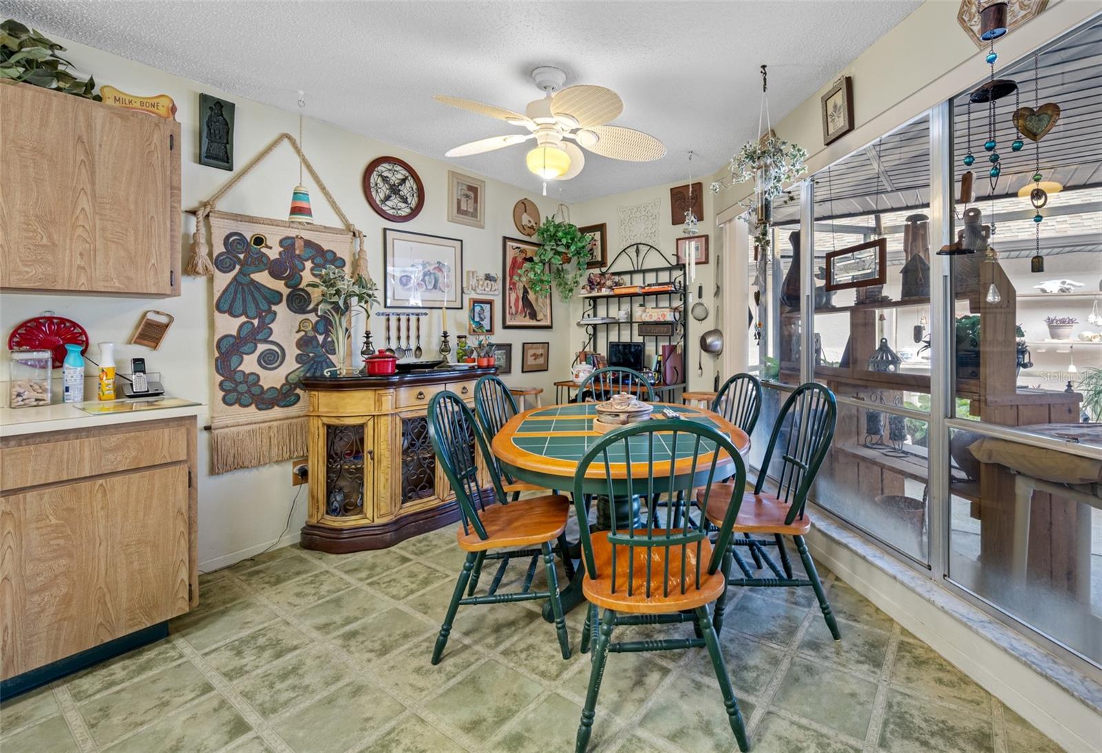 Breakfast nook next to the bright, natural-light open-air patio