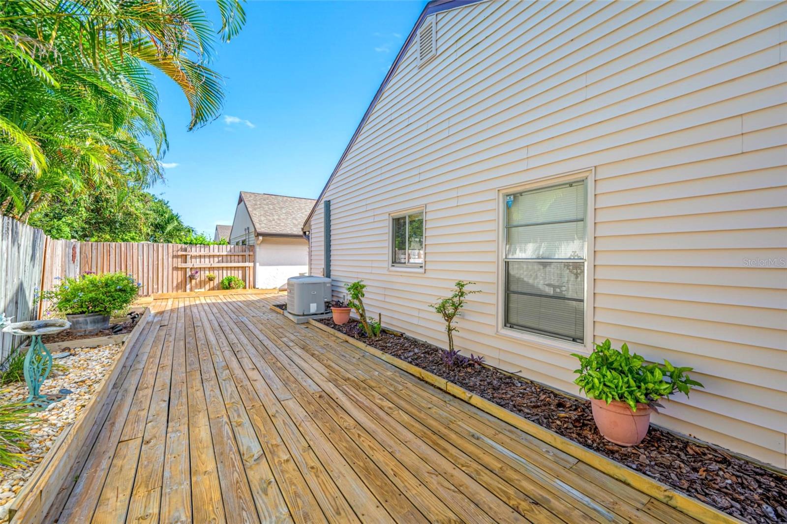 Decking continues around the back of the home for additional entertaining and relaxation space