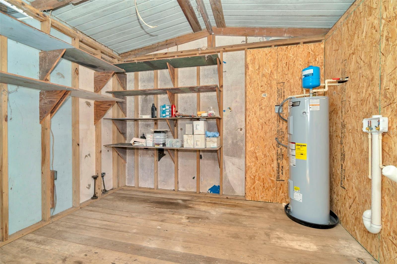 Shed for storage and laundry use.