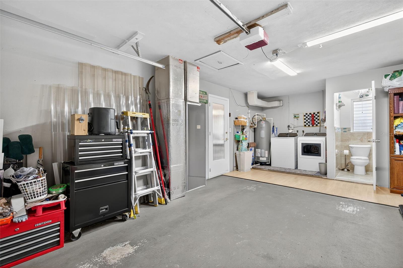 Ac unit on the left. Maintained consistently approximately every 6-12 months. Entrance to the kitchen area.
