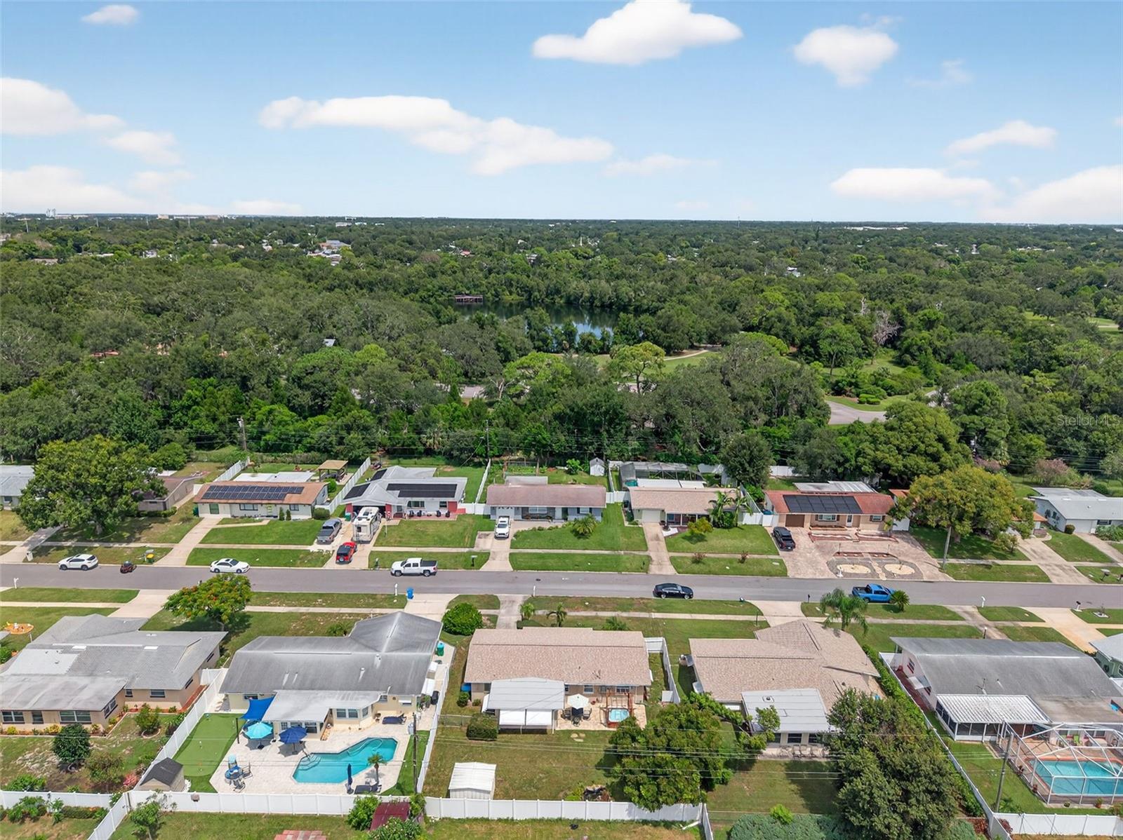 Great view of Eagle Lake Park in the top of the photo. Home is in bottom middle of photo.