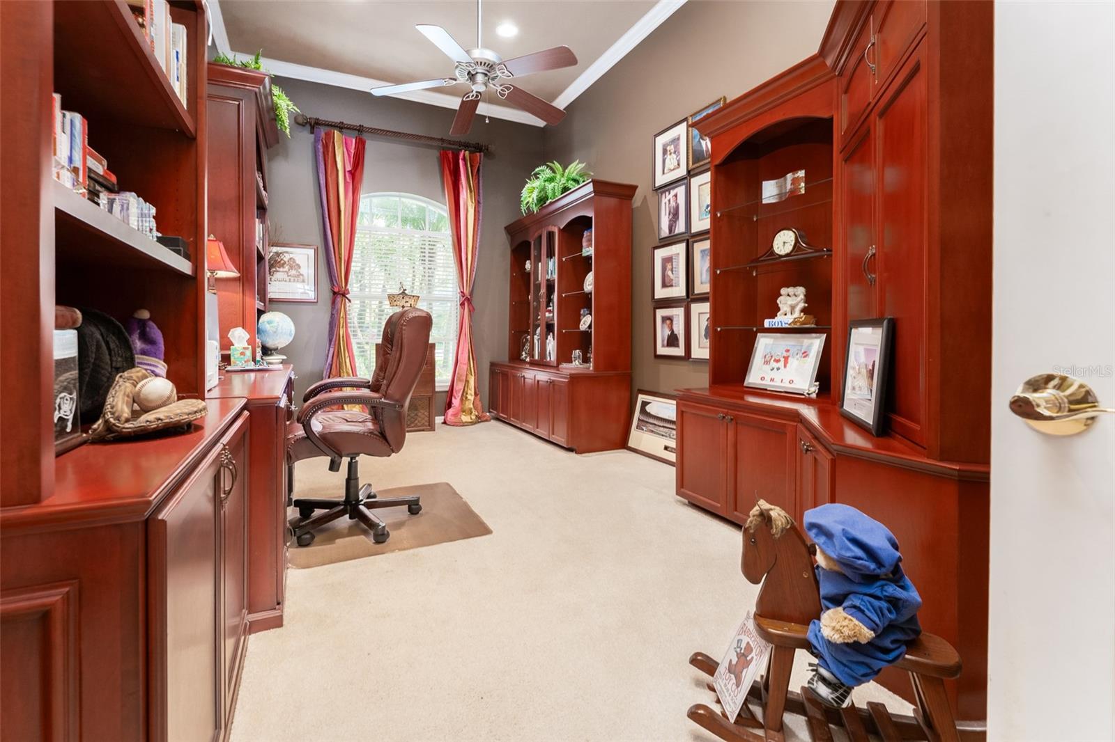 Large Office off Foyer with Double Glass French Doors & Sconce Lighting at Entryway
