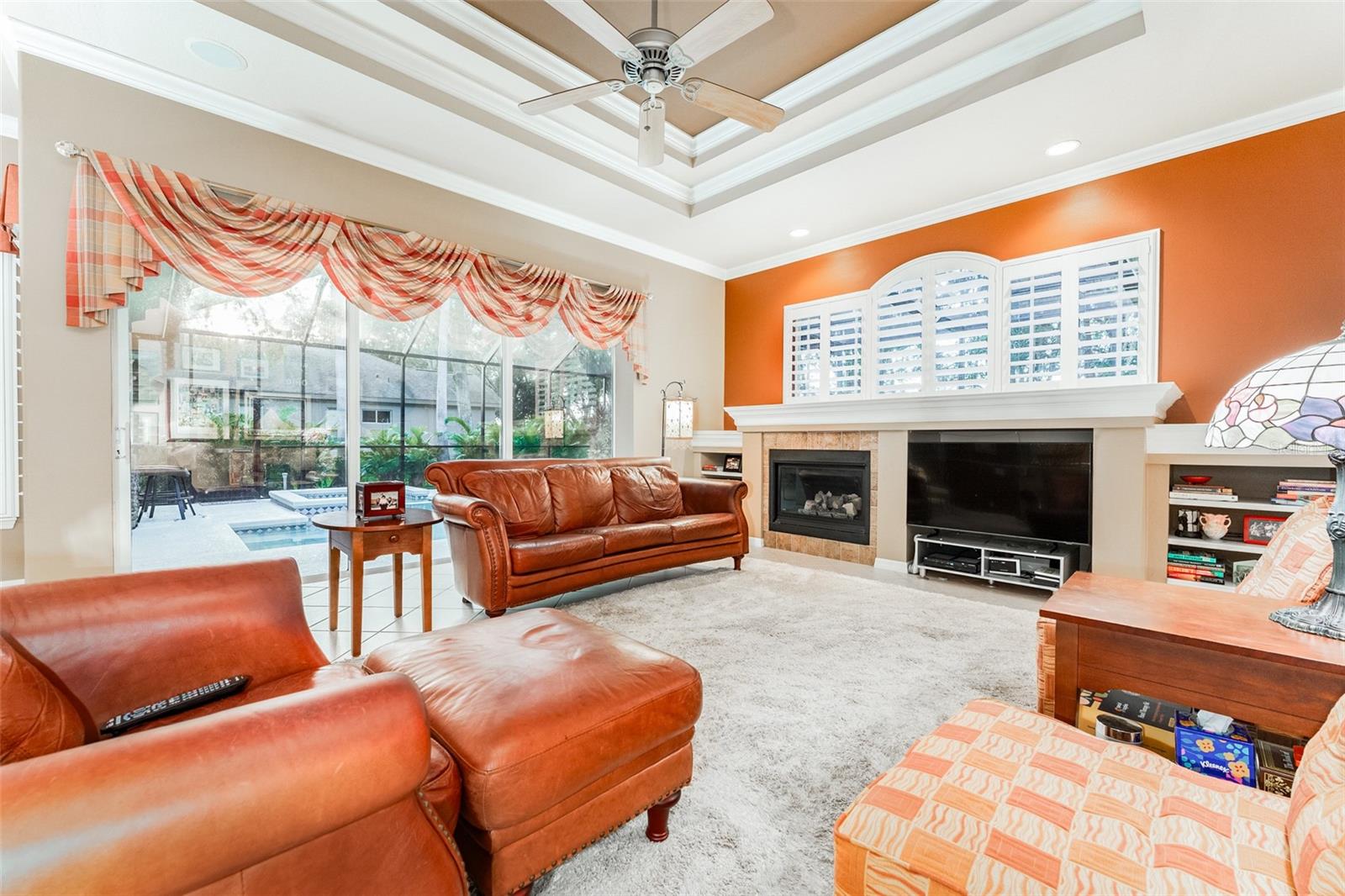 Spacious Family Room with Gas Fireplace & Coffered Ceilings