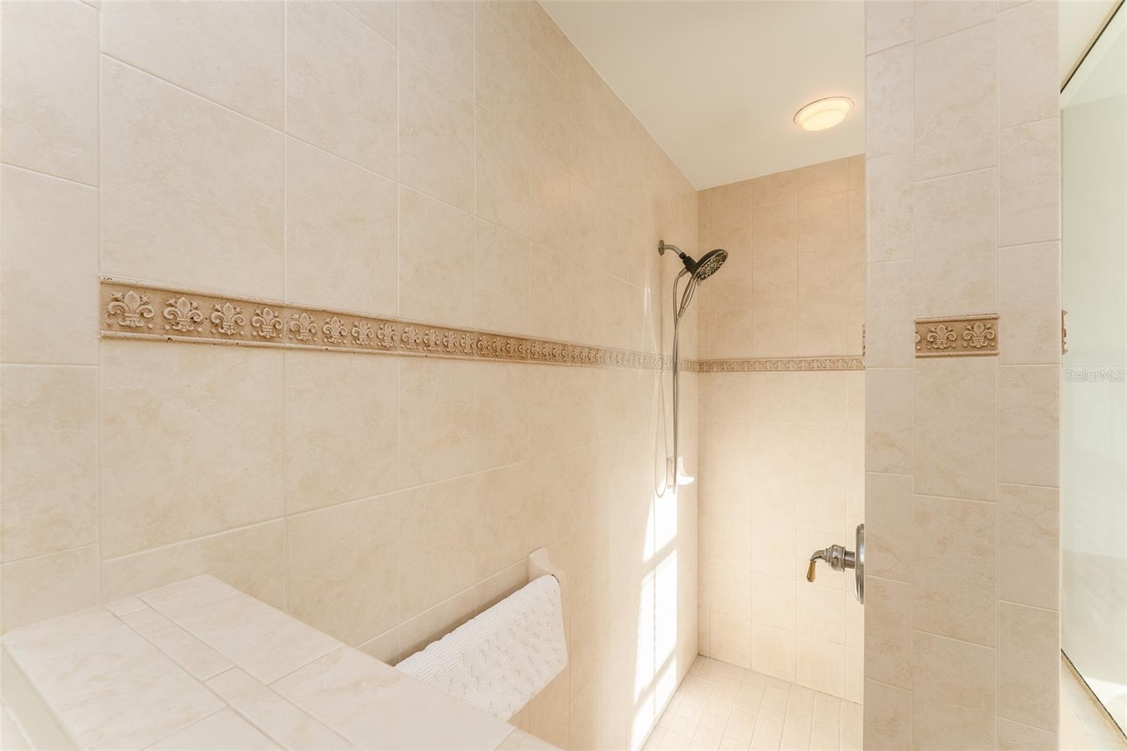 Primary Bath Walk in Shower with Decorative Tile