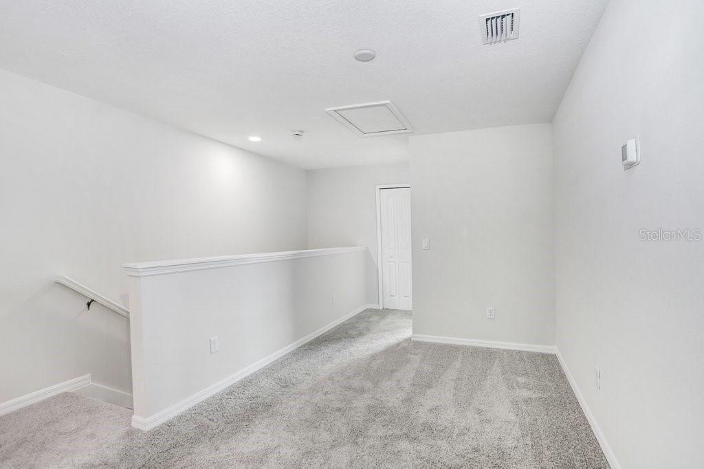 Upstairs Loft Entertaining Space (stock photo of model home)