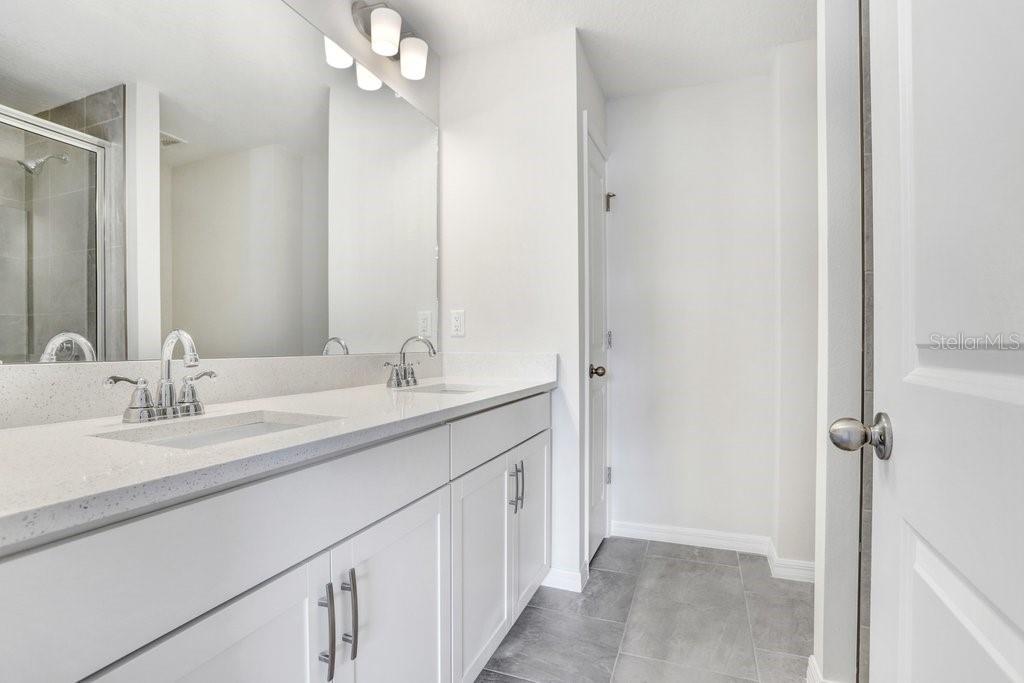Primary Ensuite with Double Vanity! (stock photo of model home)