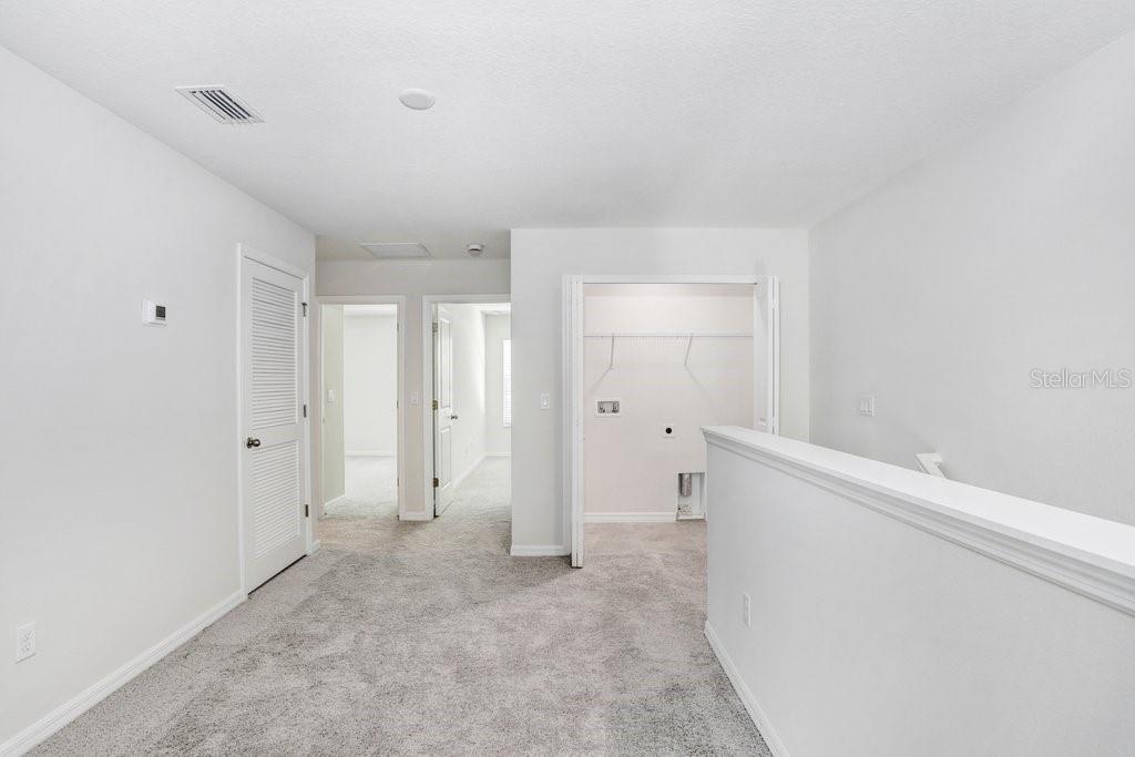Convenient Upstairs Laundry (stock photo of model home)