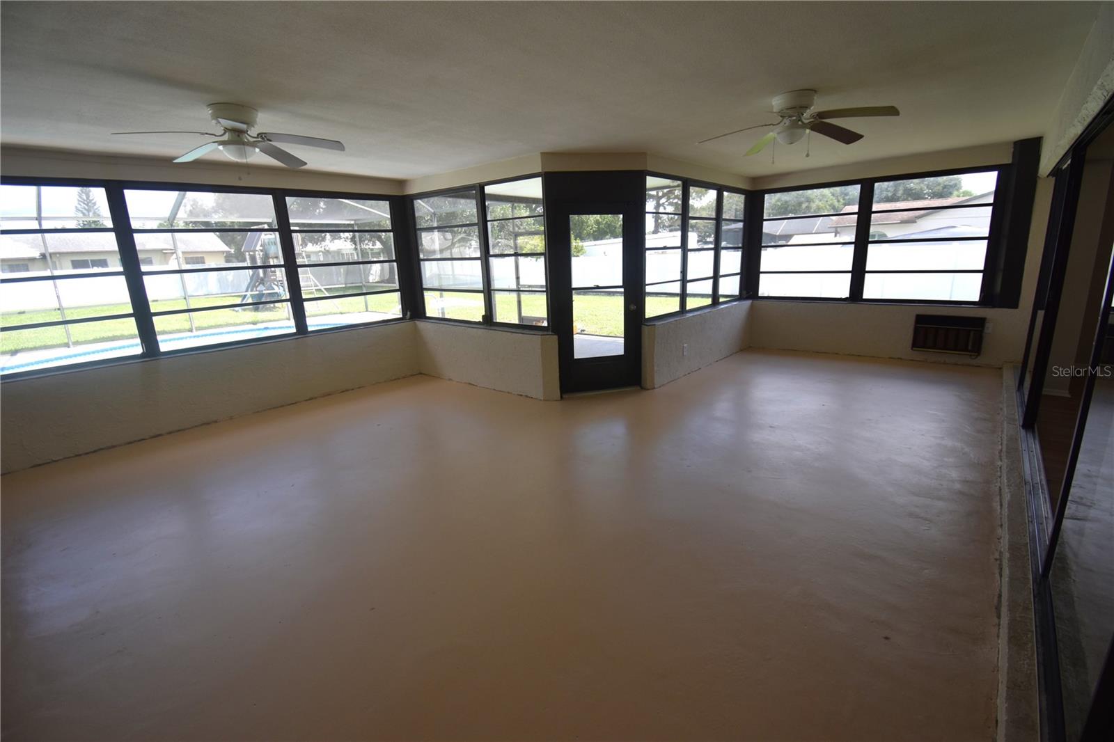 Enclosed Florida Room with over 350 sq ft not included in heated square footage