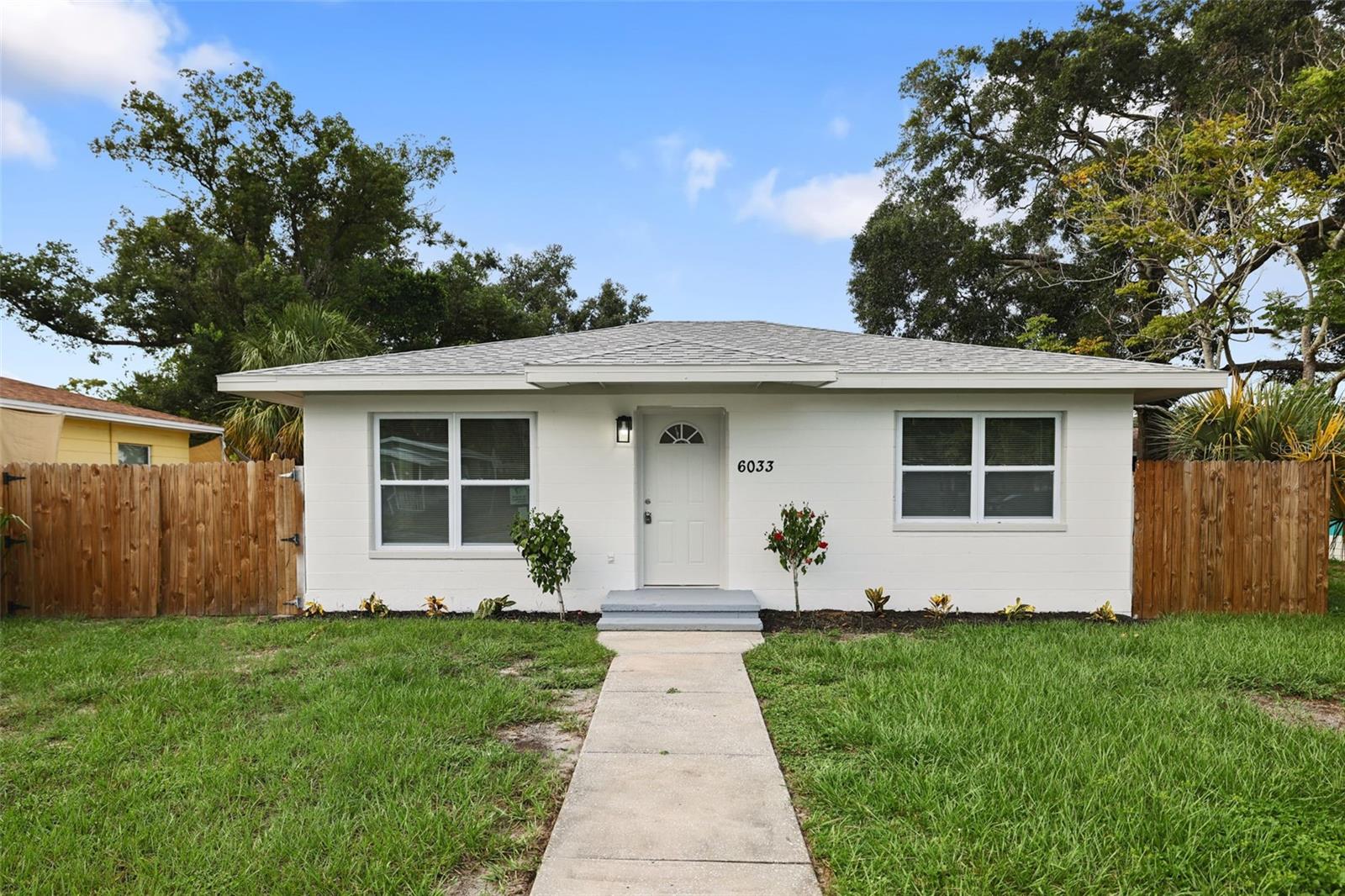 Front exterior - New roof - Freshly painted - New Door - New exterior light fixtures - New Windows