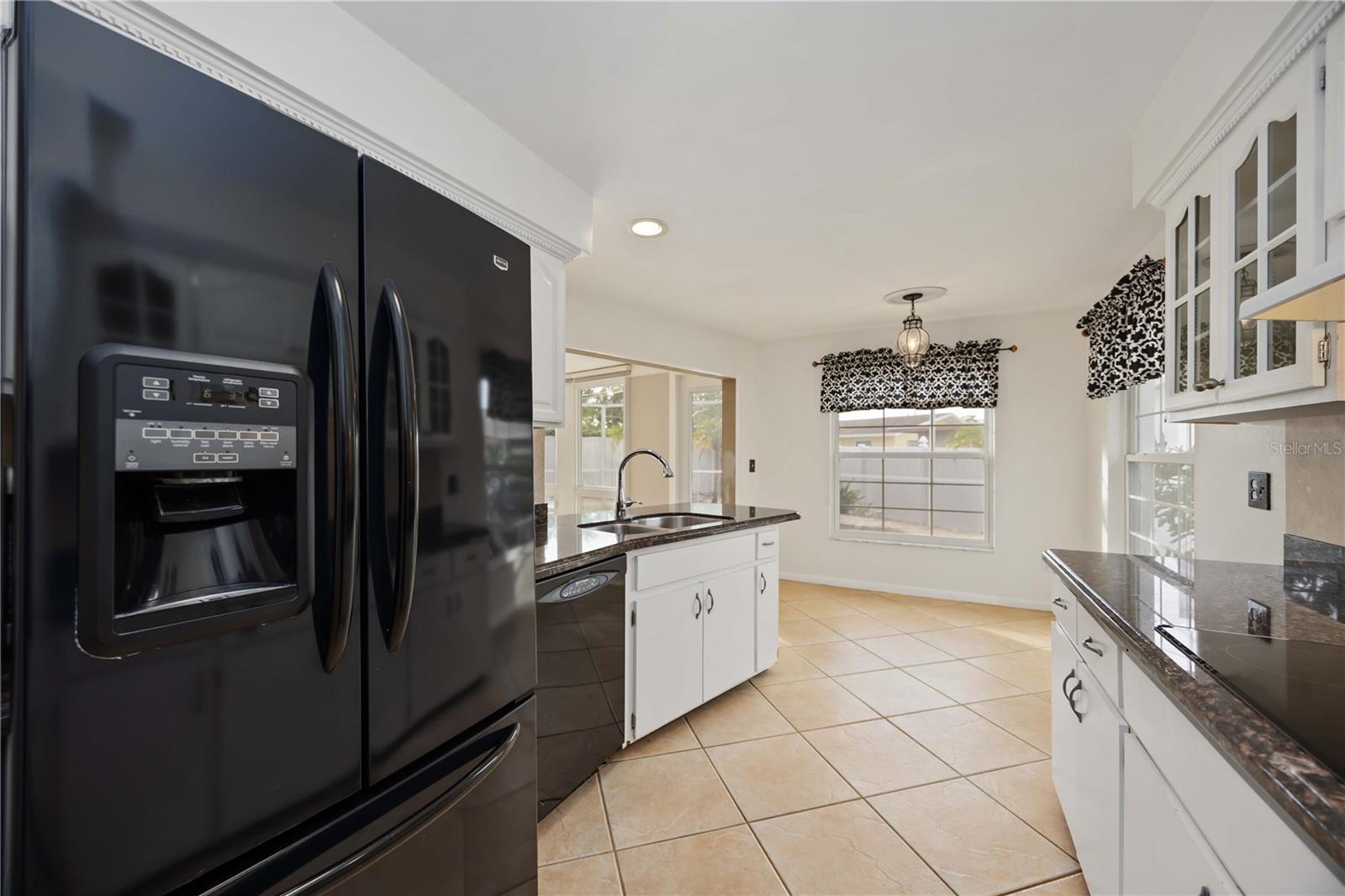 You can keep the dinette area, or build a larger kitchen.