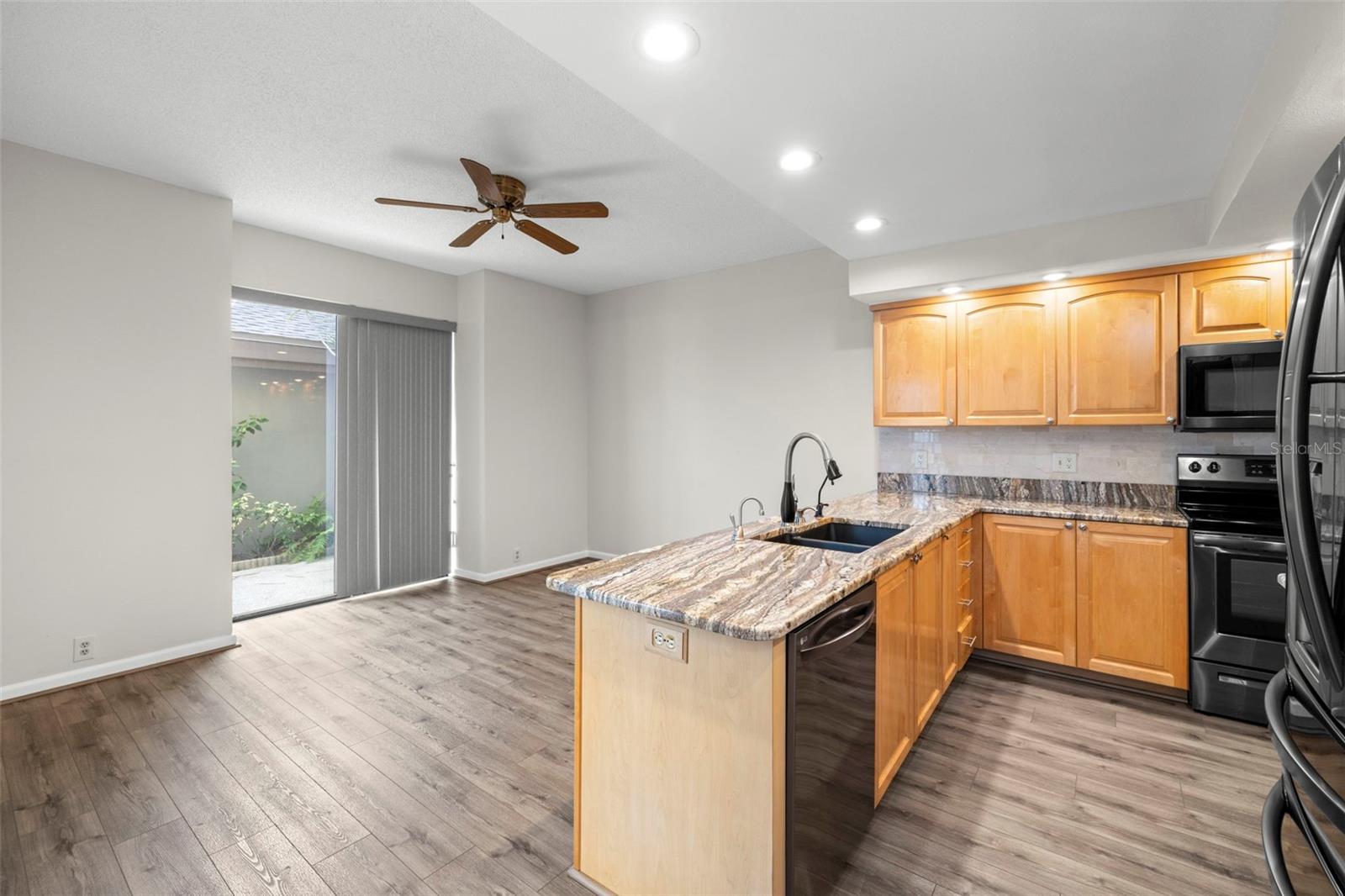 Breakfast bar with sliders to front patio