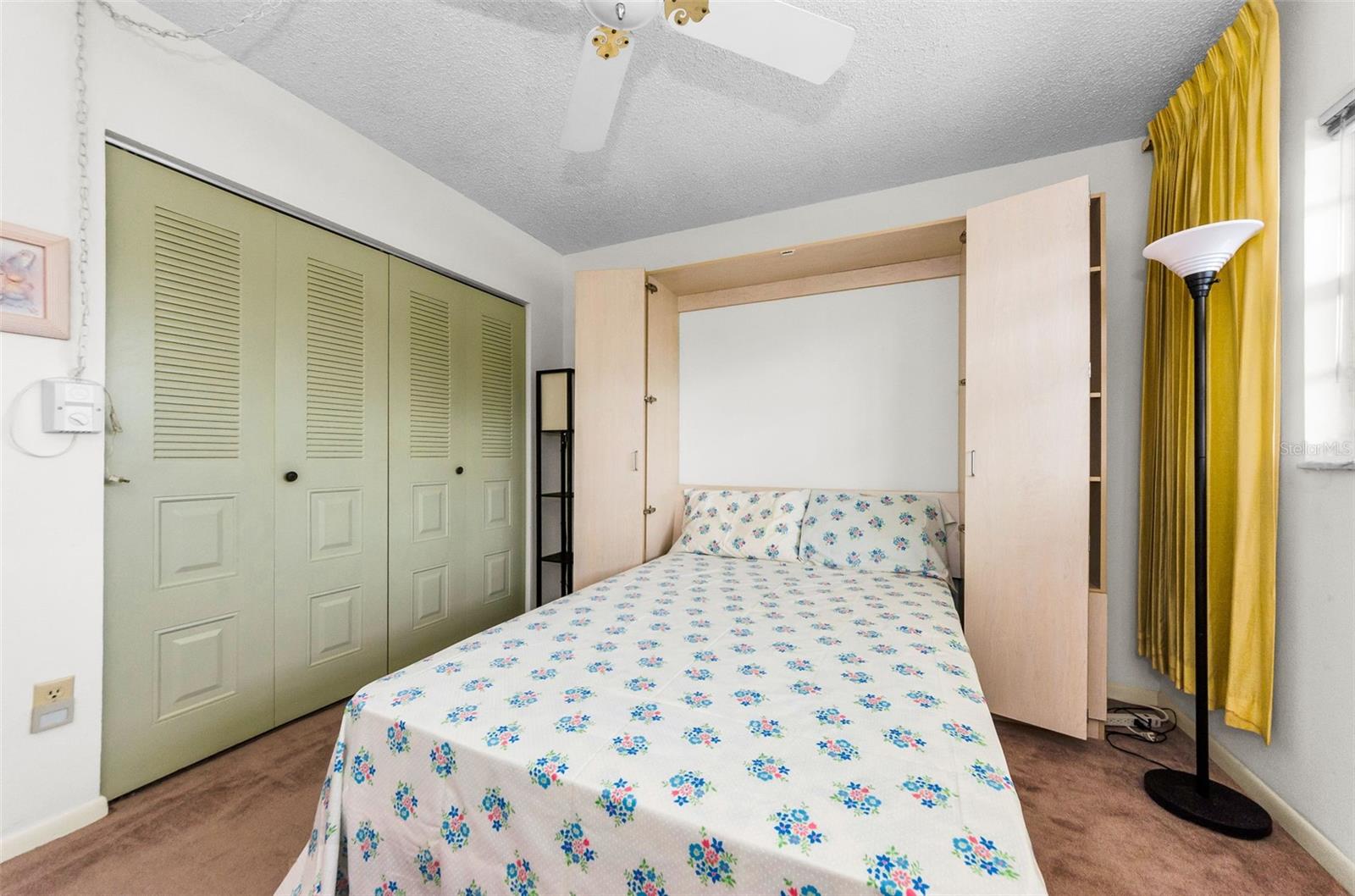 Bedroom with open Murphy Bed