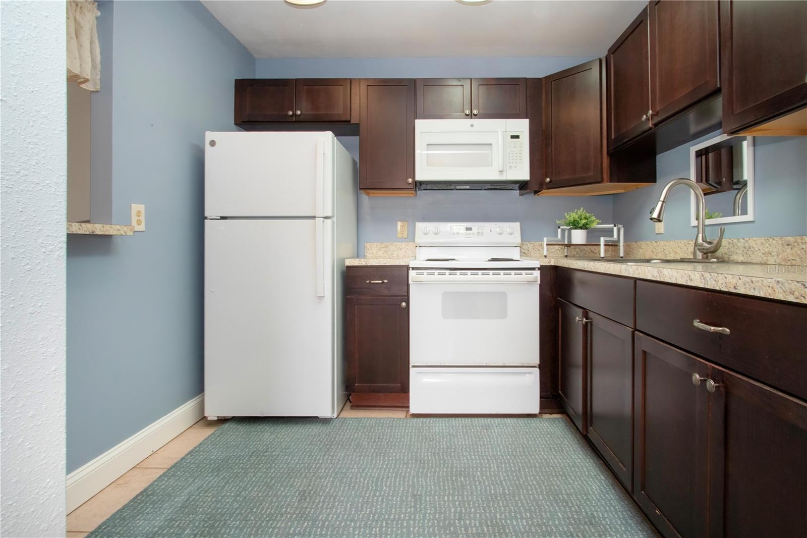 Kitchen has new refrigerator