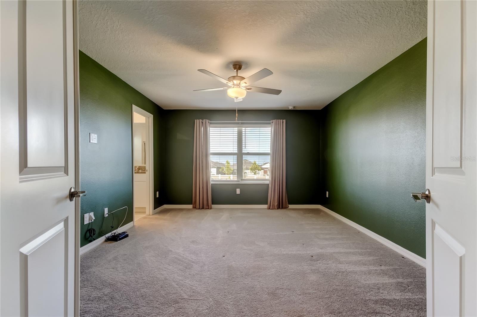 Double door entrance to the primary suite