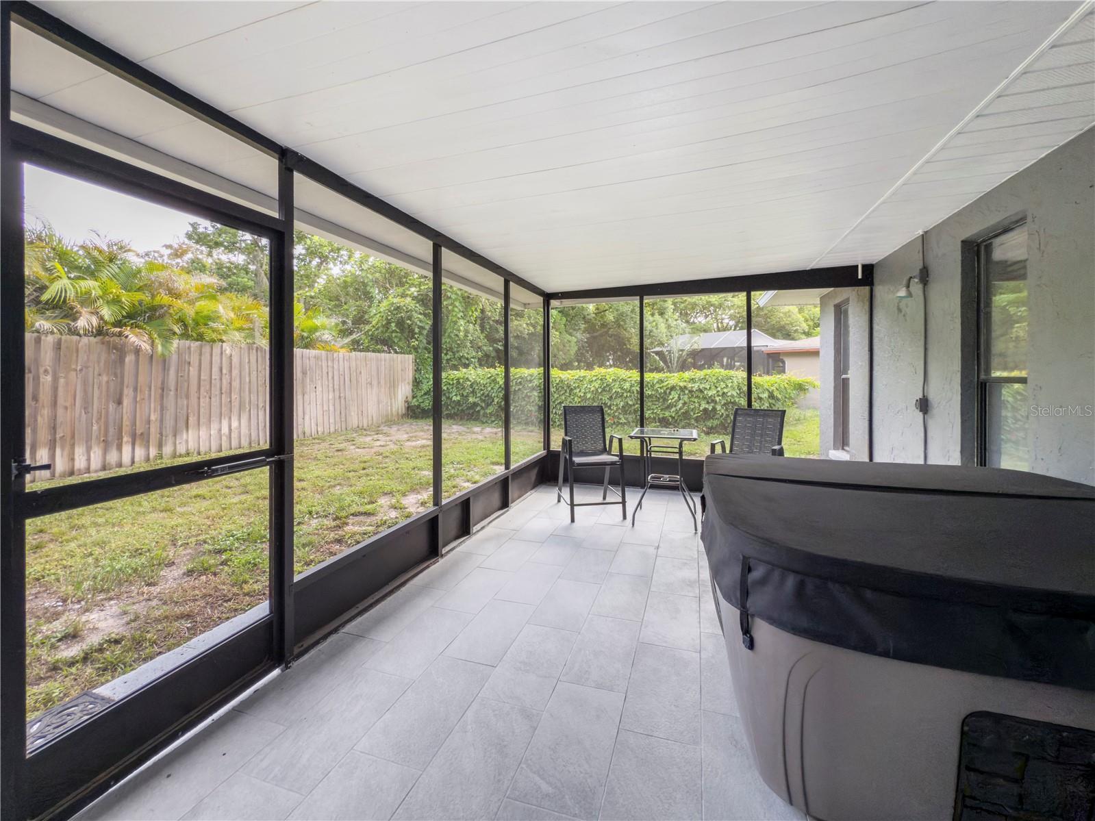 Screened in Patio with Jacuzzi