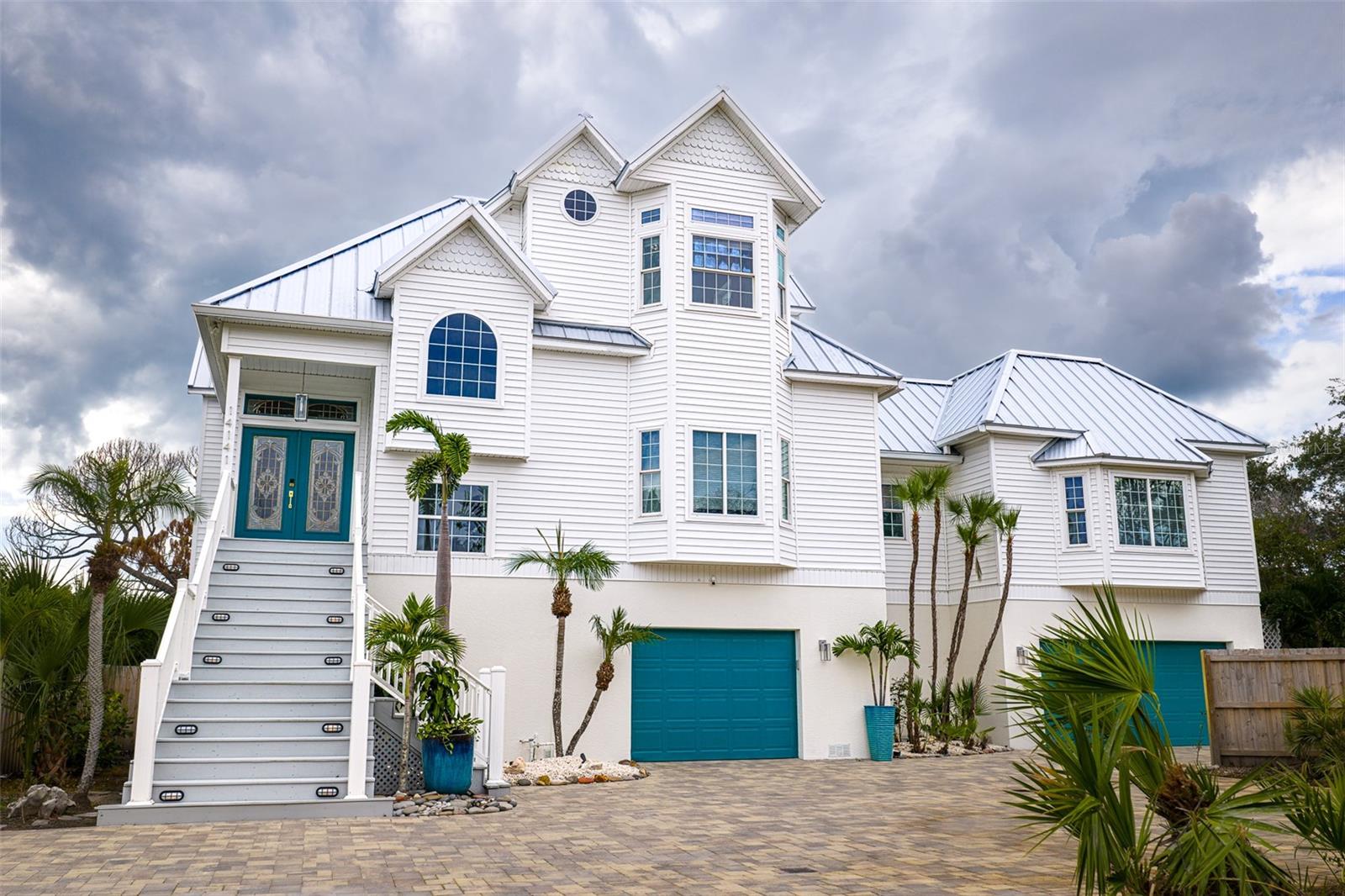 Welcome to 14141 76th Ave, a magnificent private retreat boasting timeless elegance and coastal flair!