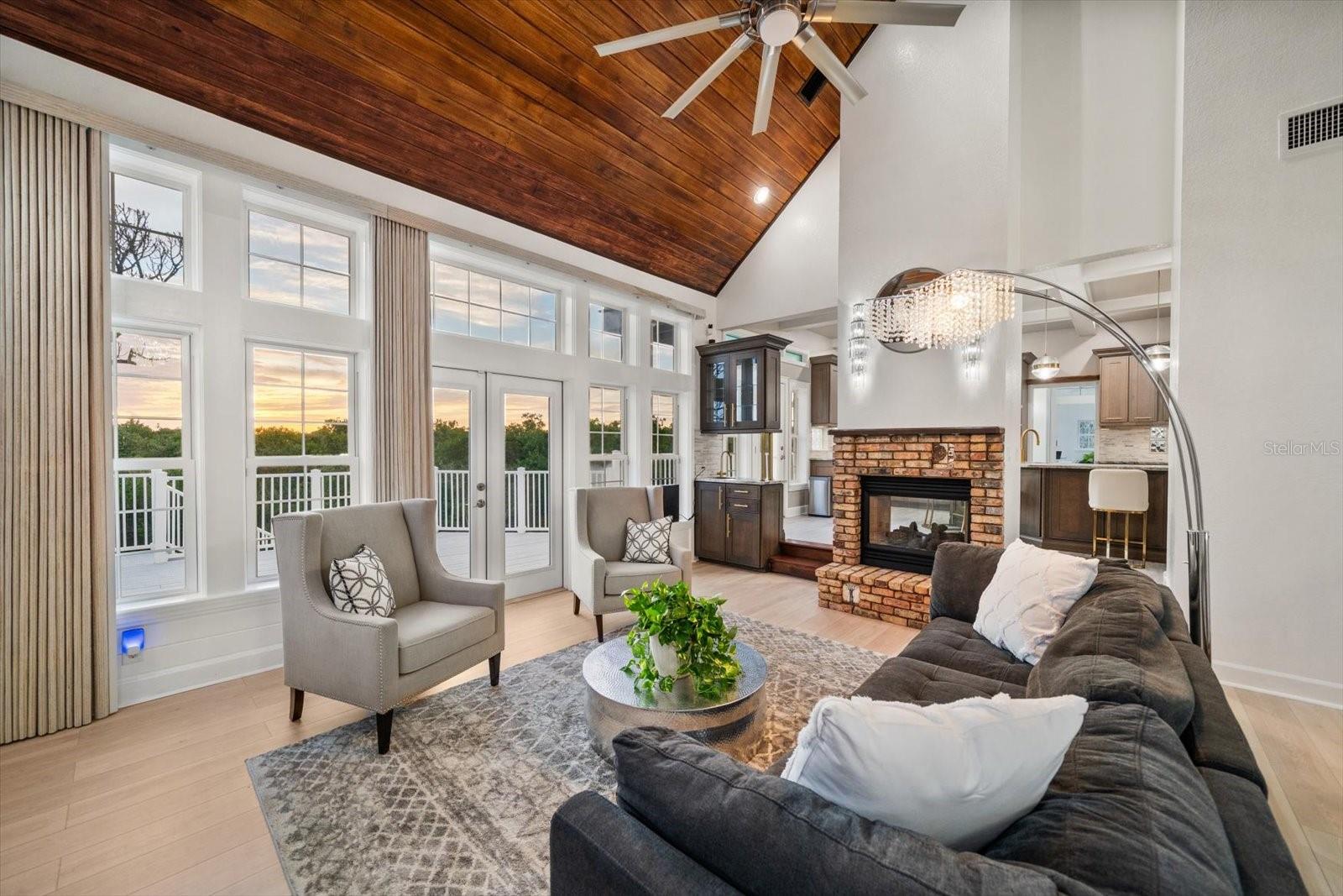 Enhanced by natural light, the living room is graced with spectacular nightly views of the western horizon.