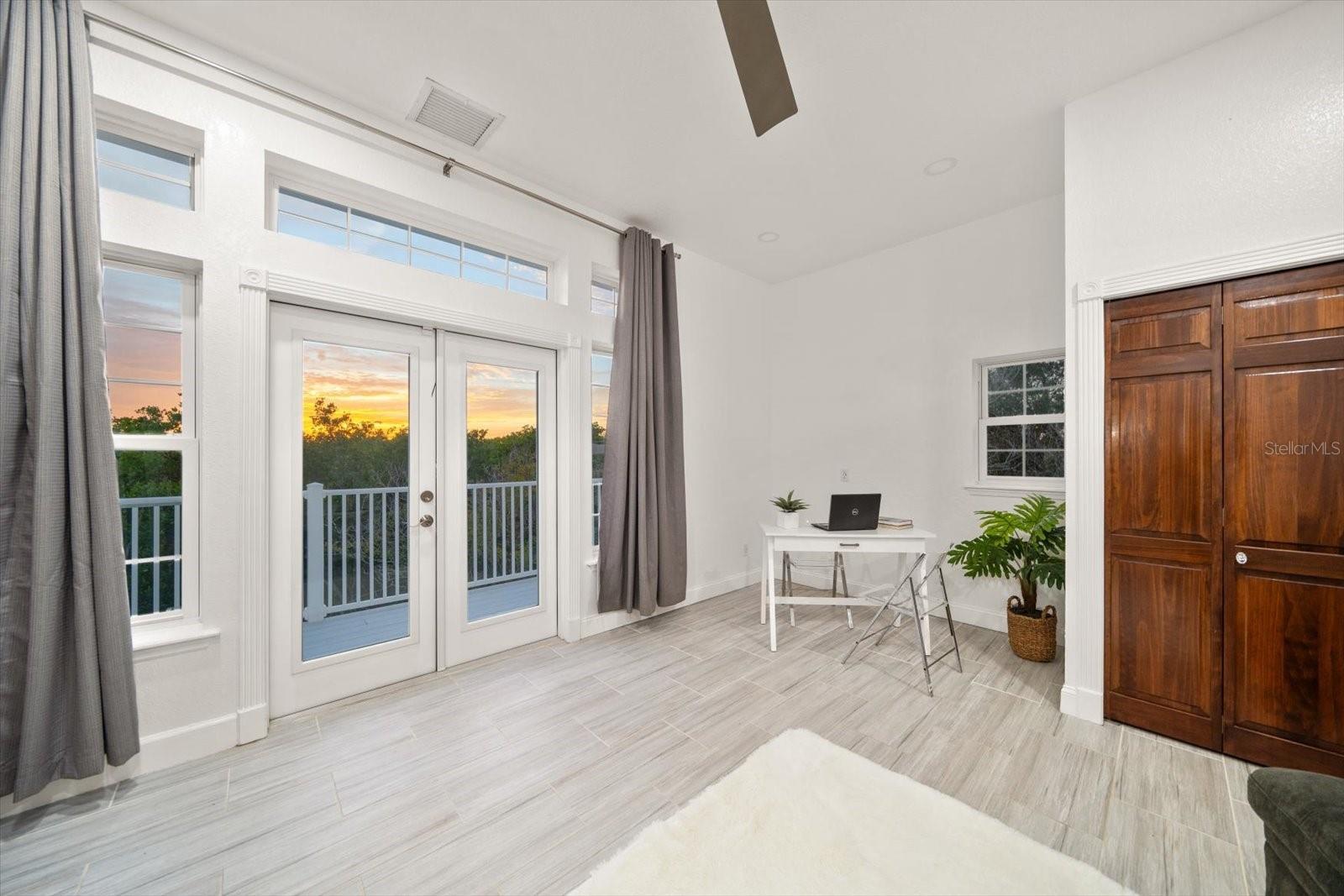 The fourth bedroom is currently used as an office space. This room offers flexibility for different uses.