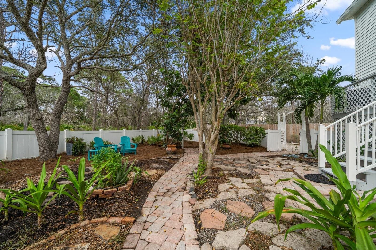 Create your perfect secret garden on the spacious grounds with room for a swimming pool.