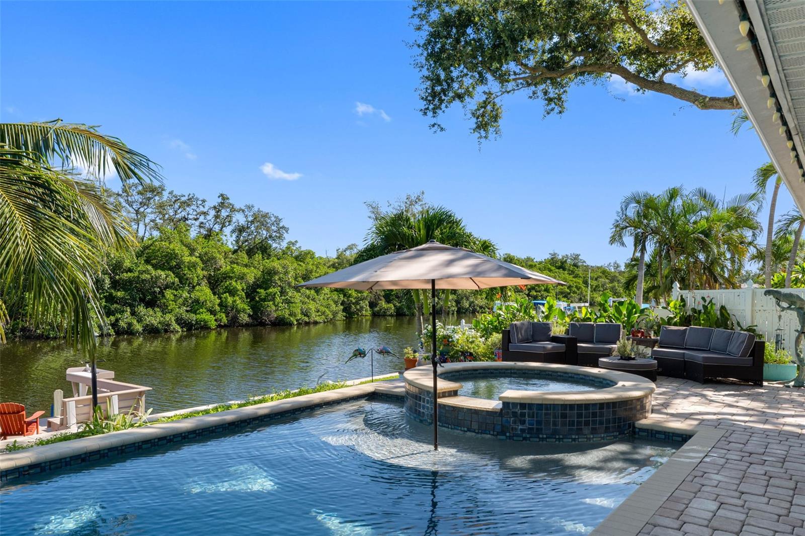 Relax in your heated pool with overflow spa