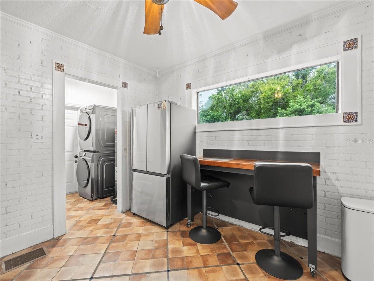 View of laundry room off kitchen