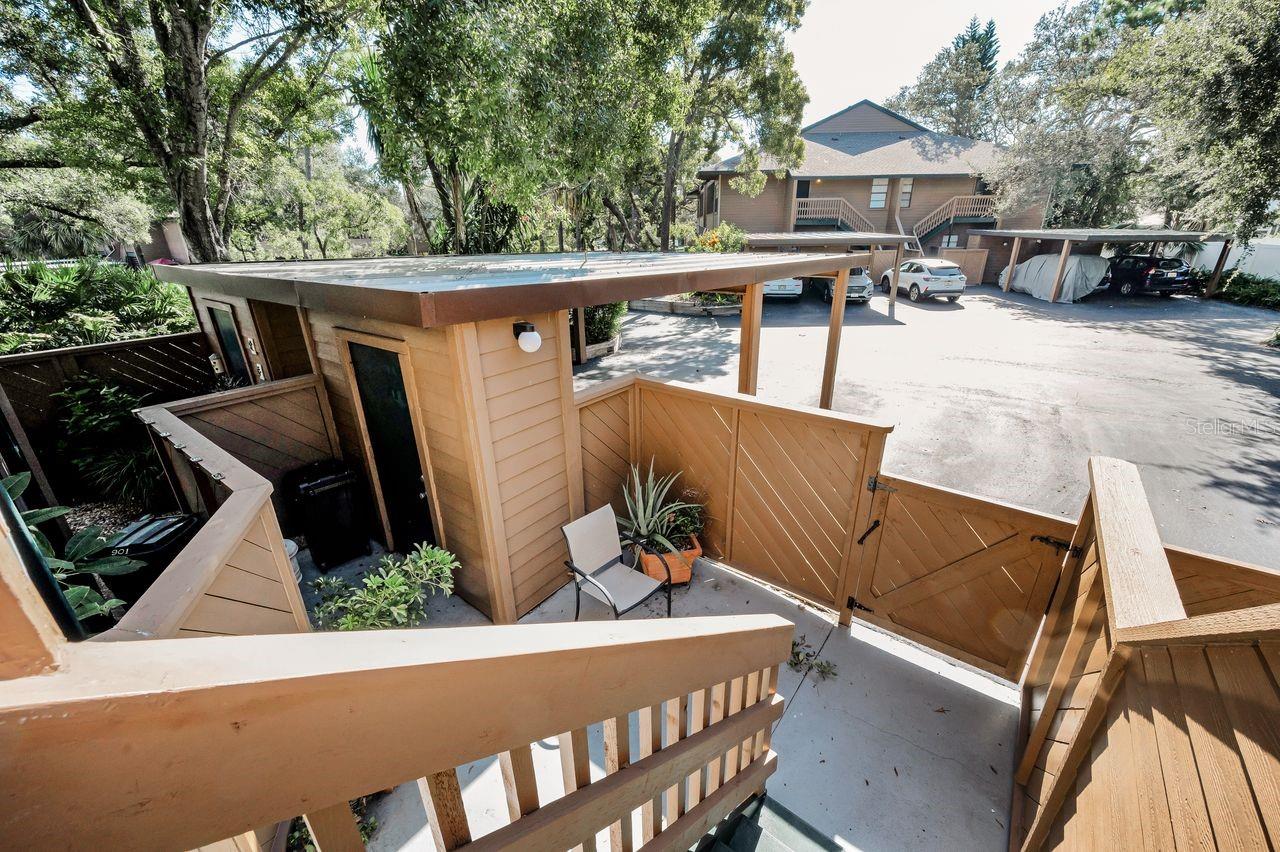 Looking down into private courtyard and secure storage area