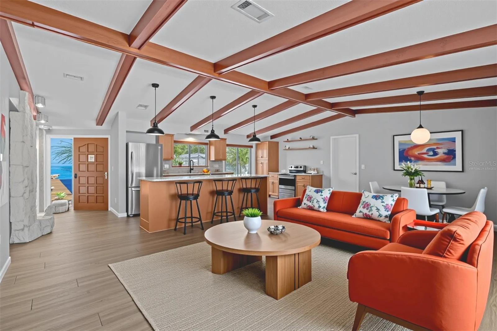 Virtually staged great room with a different option for furnishings.