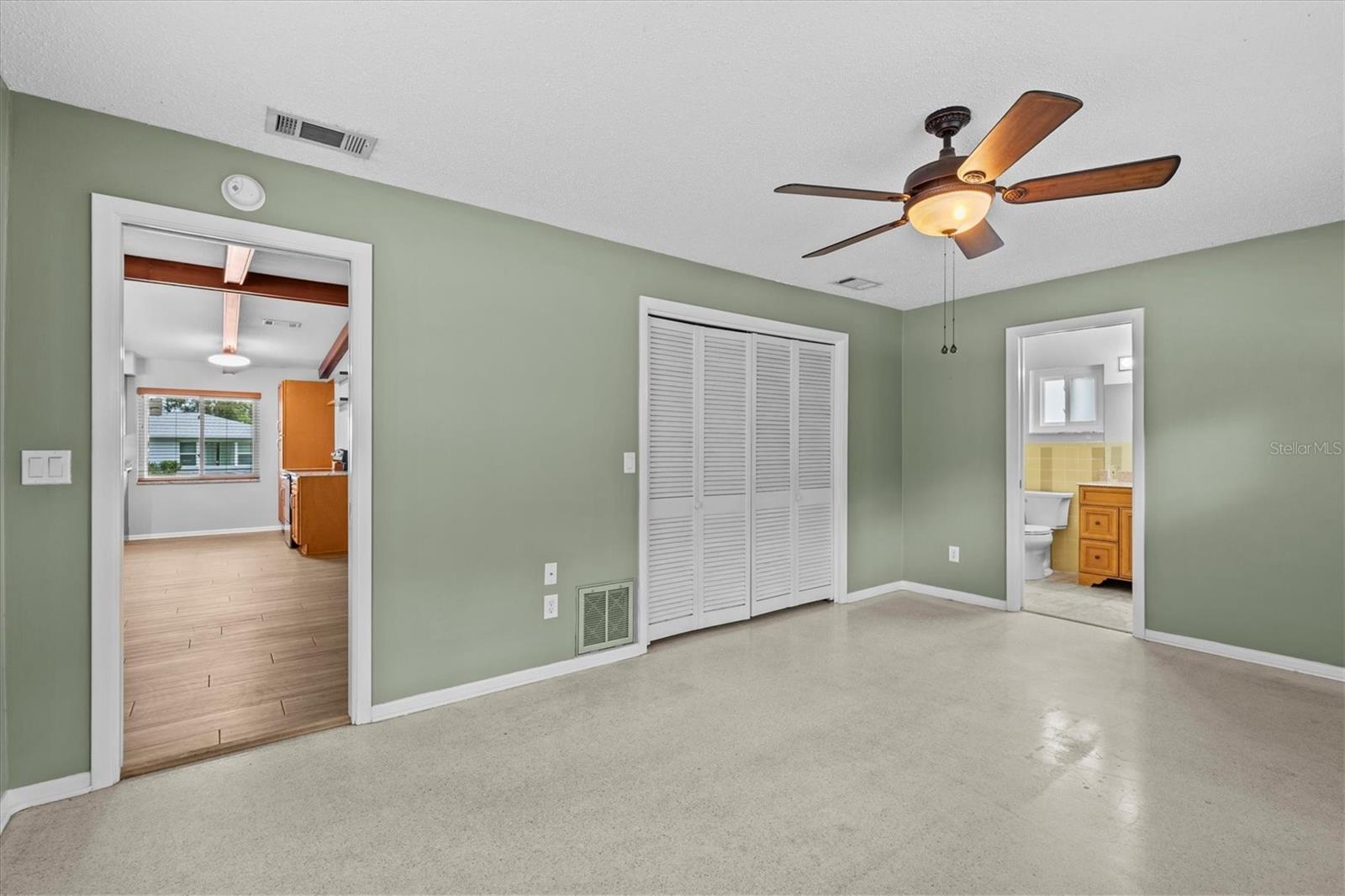 Pocket door to great room and ensuite bath and double closet.