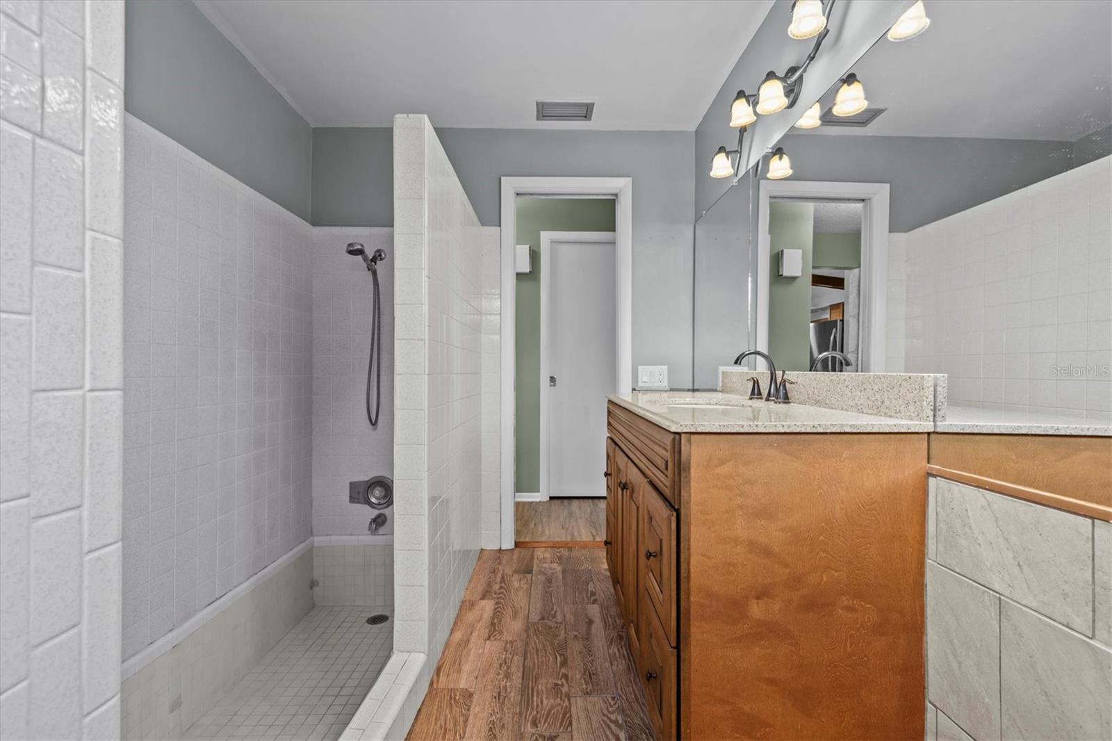 Spa-like Mid-Century Modern sunken tub/shower.