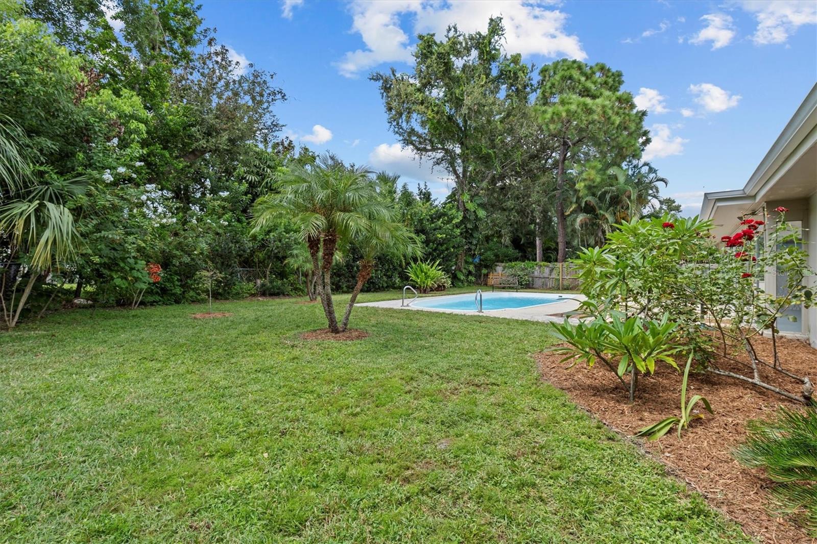 Room to garden or to let the kids and pets play safe and secure with fencing all around.
