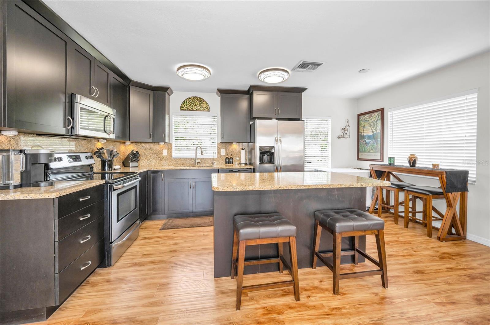 Great for those folks who love cooking space. Cabinet packed & plenty of counter space.