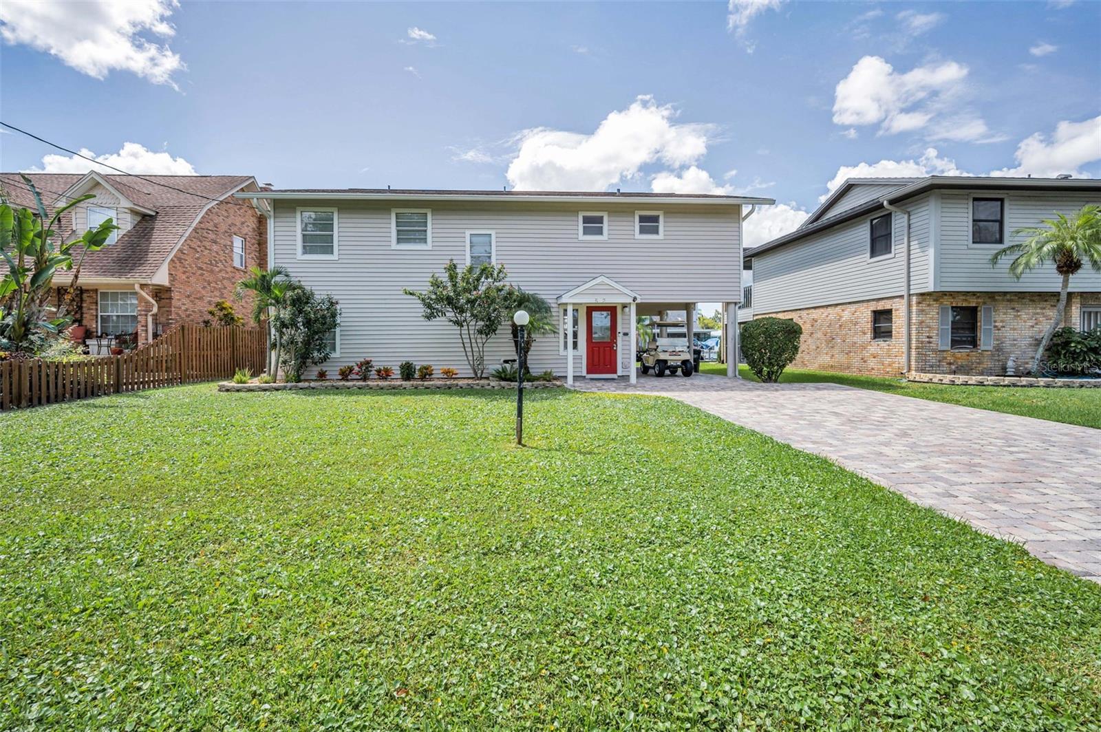 Large front & Back yard Nicely landscaped & paved drive and back patio