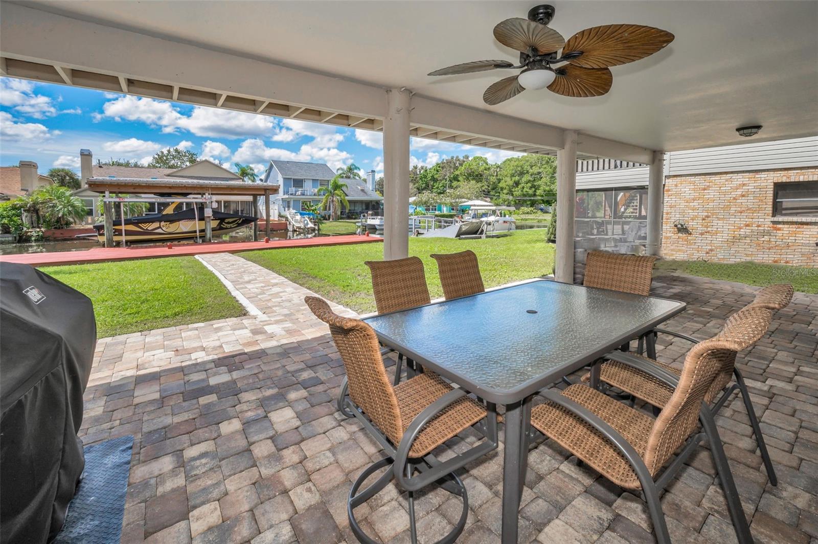 Carport has plenty of room for a trailer & golf-cart and vehicle