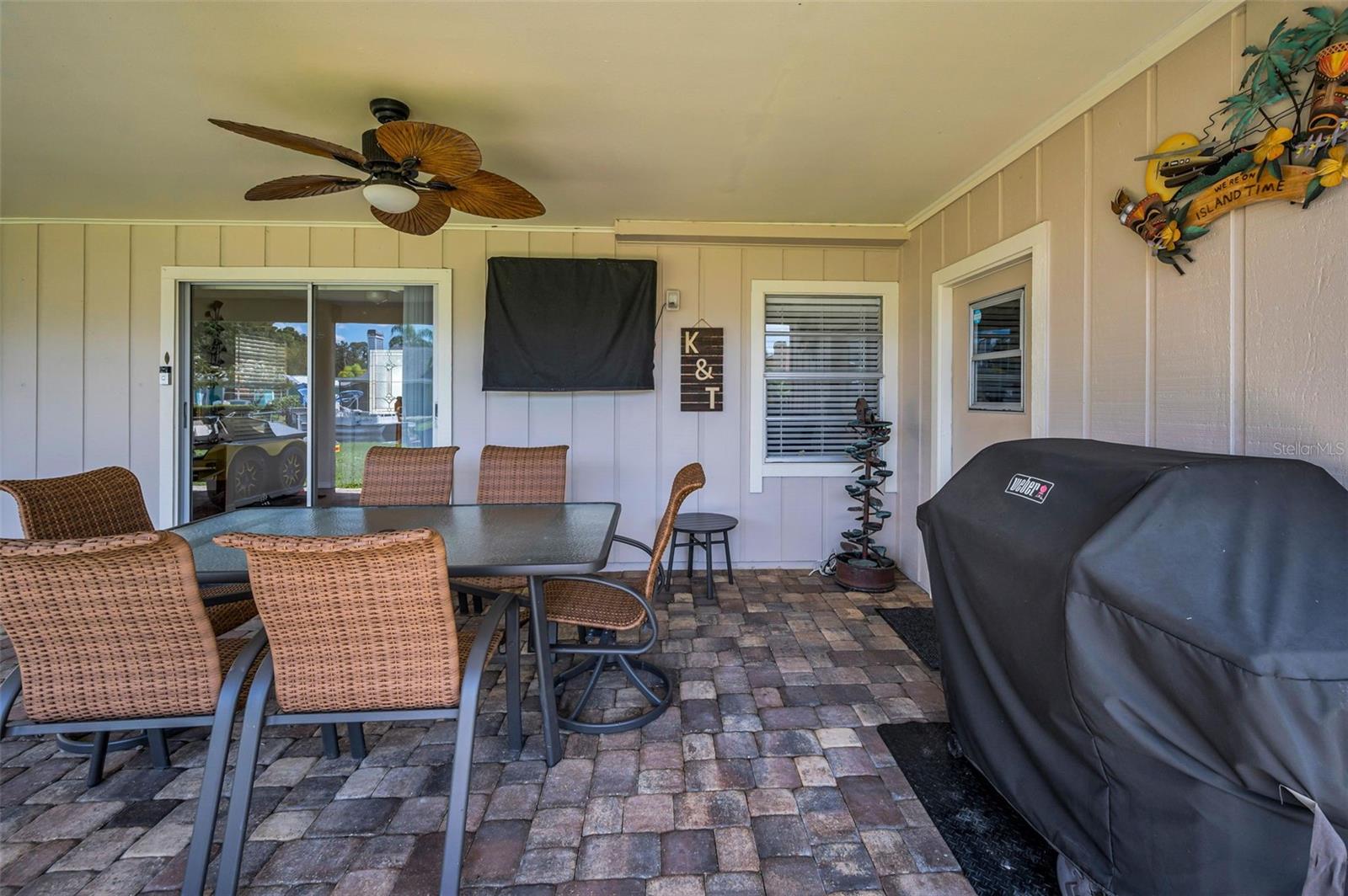 Sliders off the main entry foyer to outdoor living