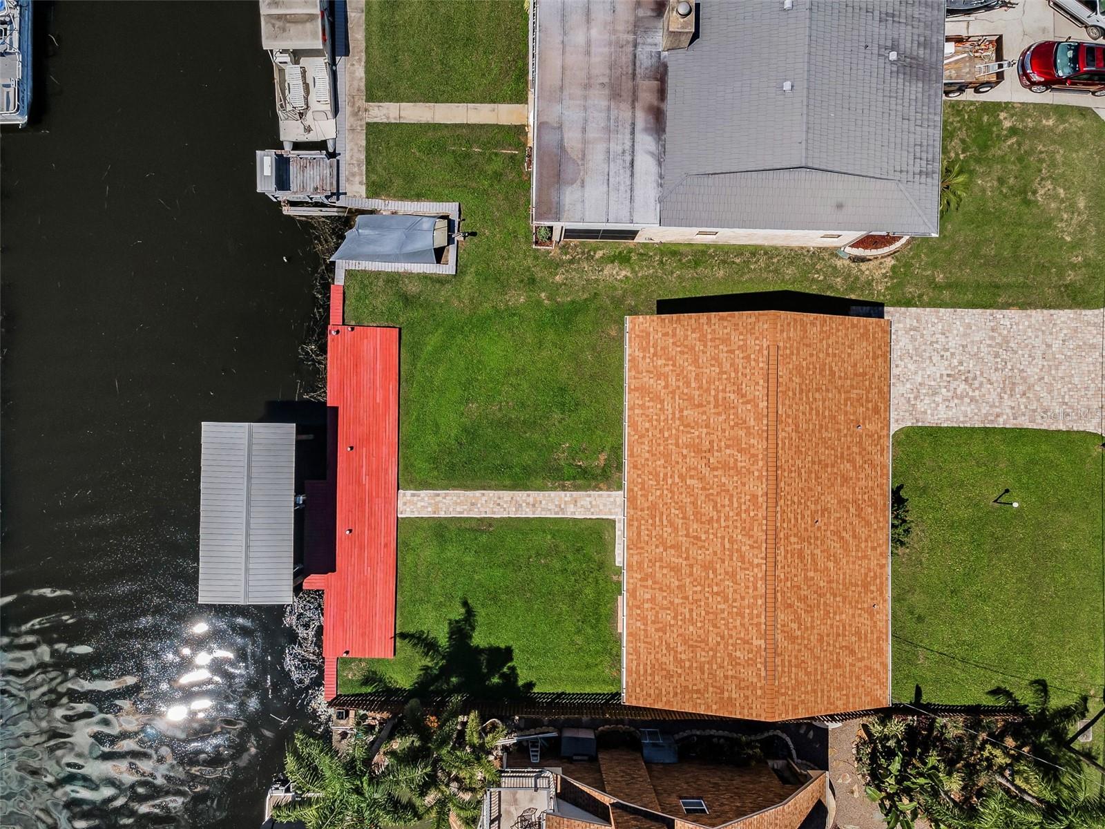 Newer roof, Seawall, Boat house & lift