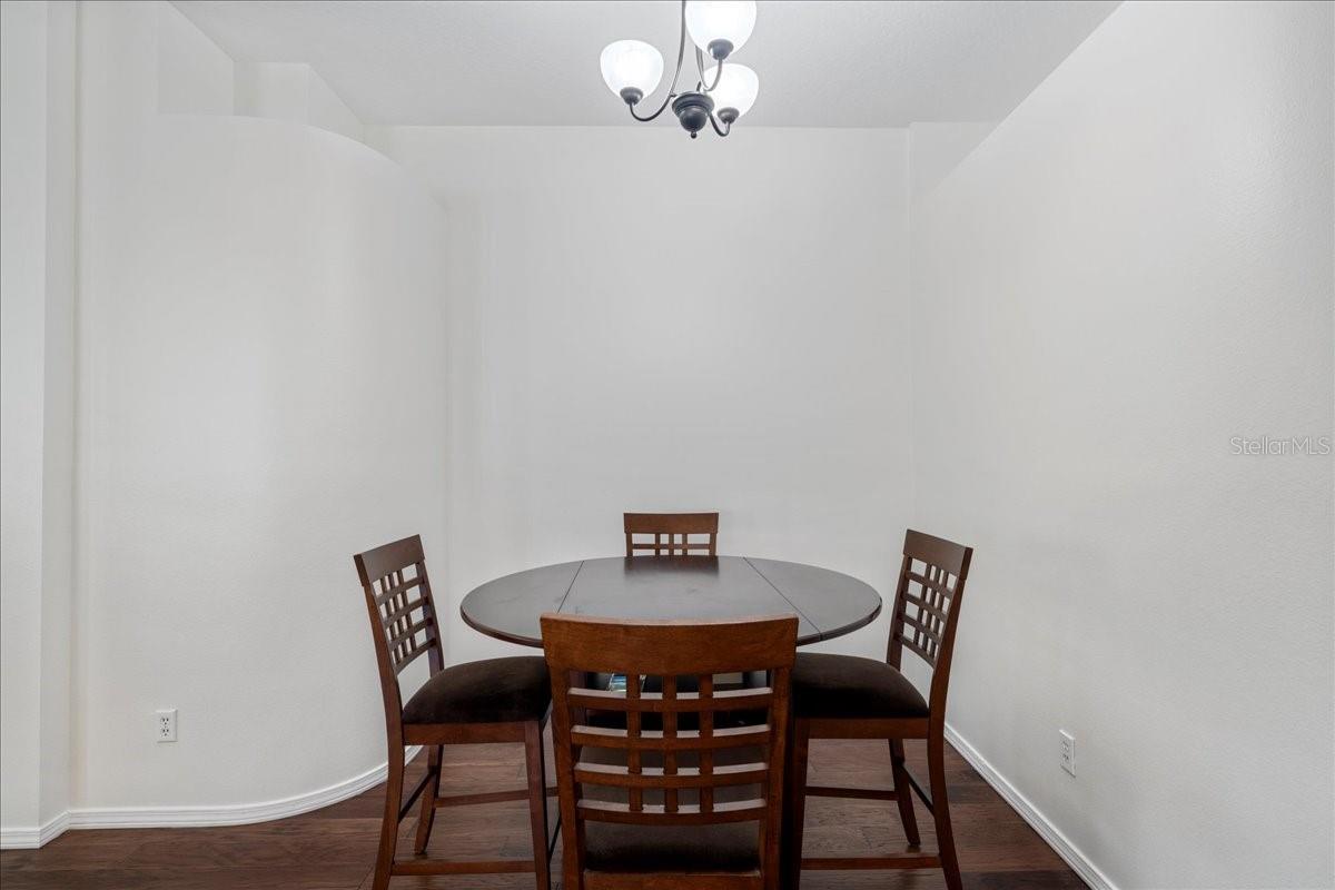 Dining room just off the kitchen flows into the living room.
