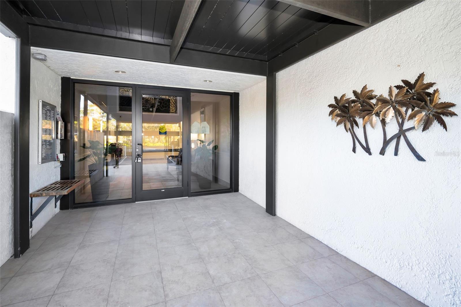 Lobby Door entrance is electronic and secured with video monitoring