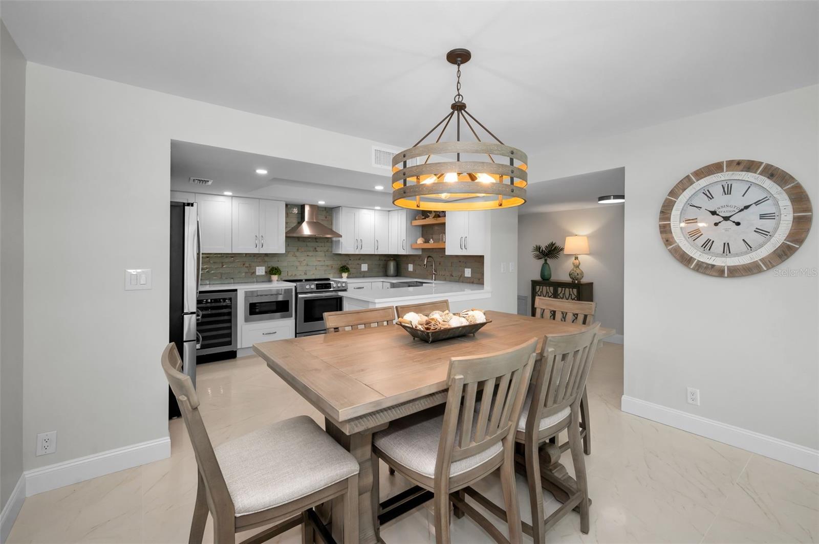 Kitchen opens to dining room perfect for entertaining