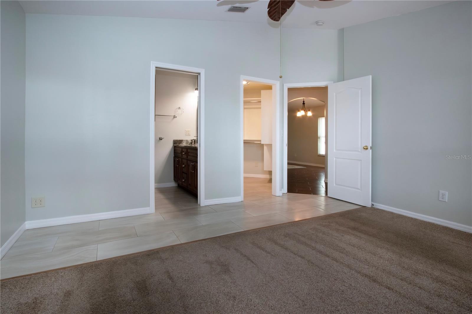 Entrance to bath, closet, and hall to kitchen
