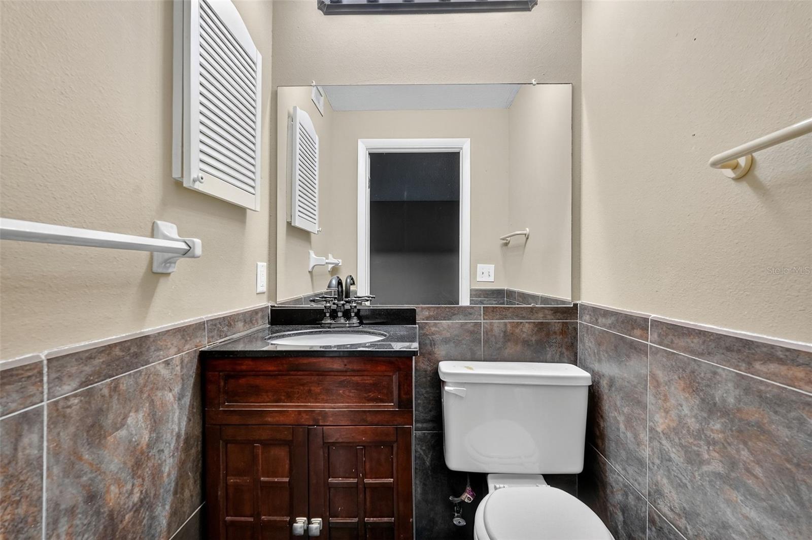 Primary suite attached half bath