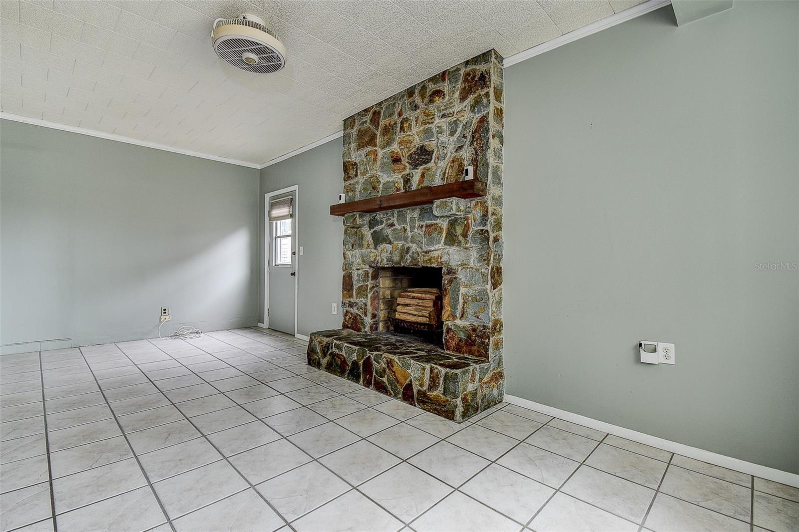 OVERSIZED FAMILY ROOM/DEN WITH ACCESS TO OUTSIDE