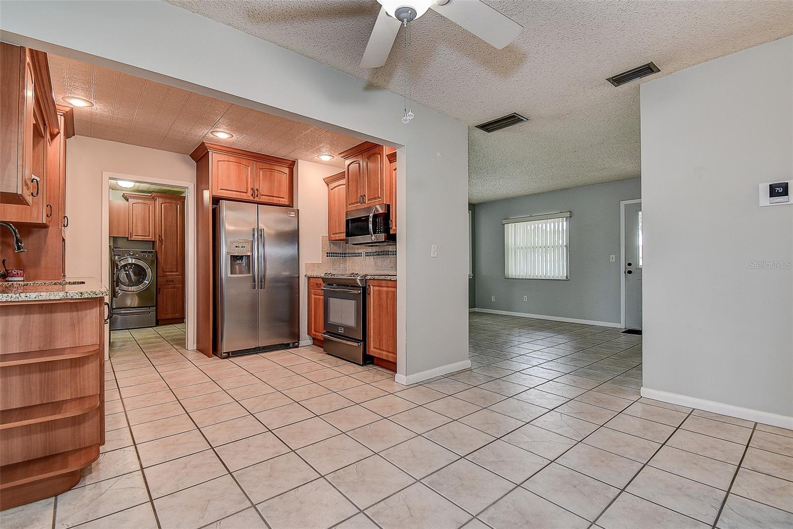 FROM DINING ROOM TO KITCHEN.