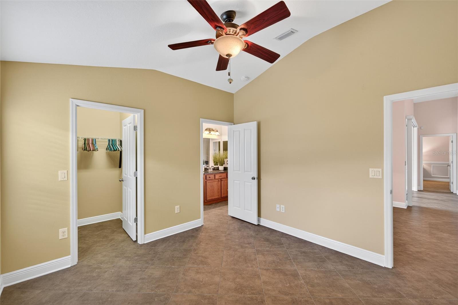 2nd Bedroom showing Doorway to Closet, 2nd Full Bathroom and Exit to Dinette and Family Room Near Doorway to Lanai