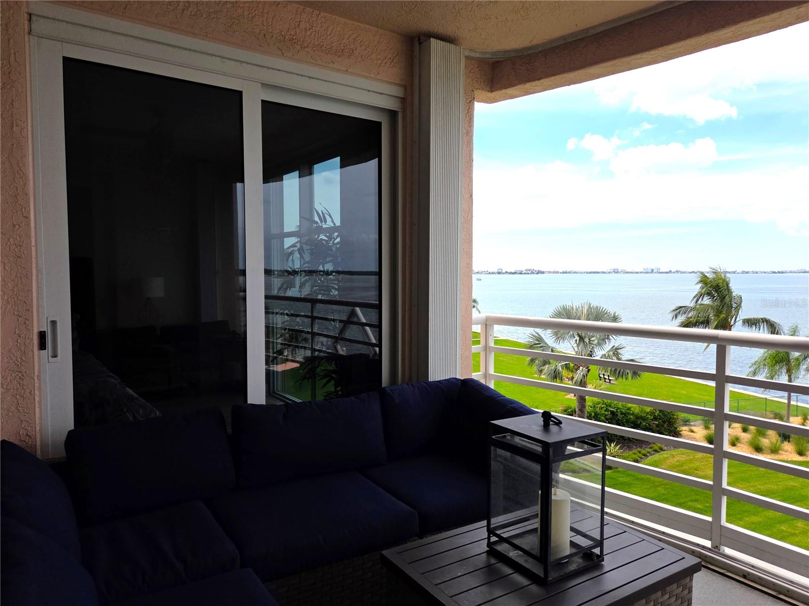 Private Balcony with Sliders to Living Room, Family Room and Master Bedroom