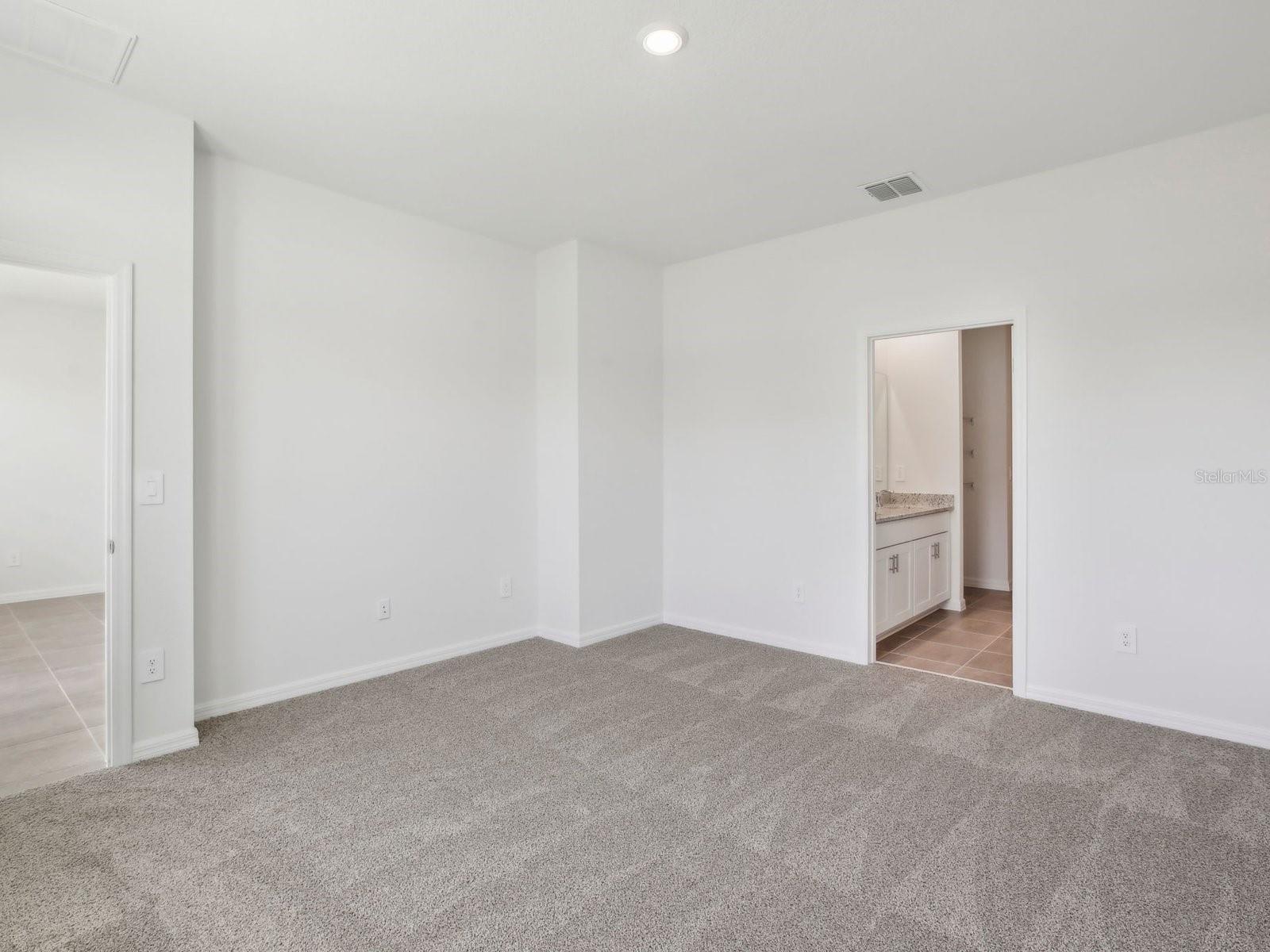 Interior photos are not of the actual home but are photos of the builder home with same floorplan with similar interior finishes and features.