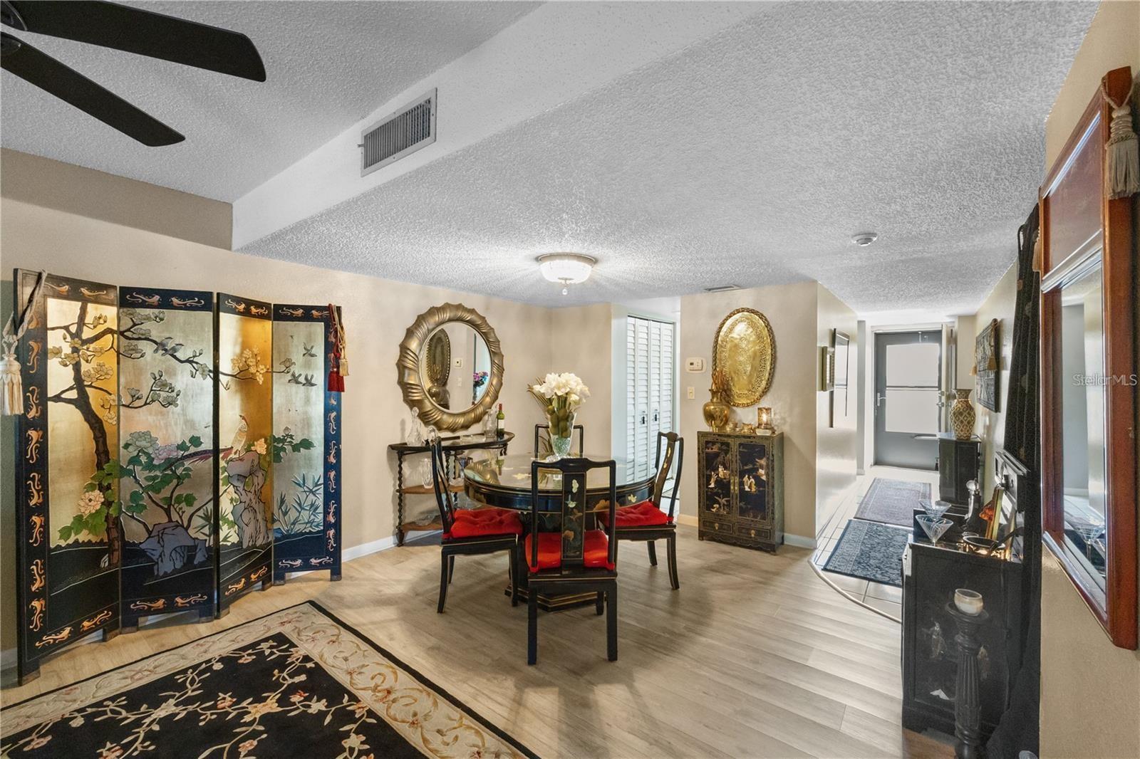 View of front door and dining area