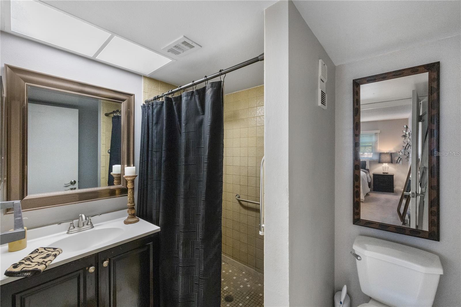 En Suite Bathroom with walk in shower off Primary Bedroom