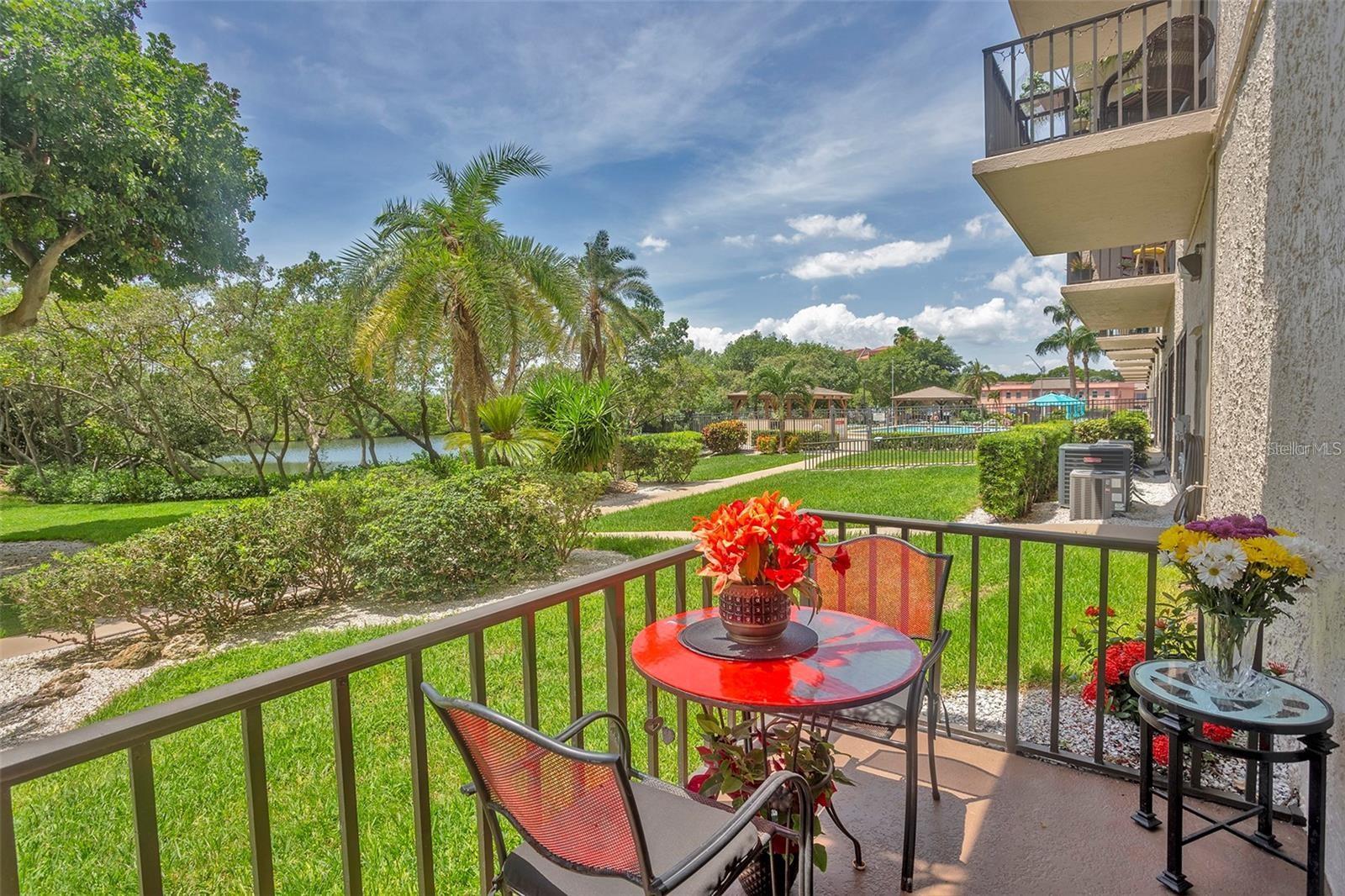 Private Patio with view of Water and Pool area