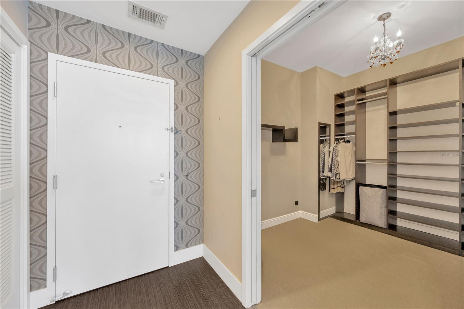 View of Front Door and Den/Custom Designed Dressing Room