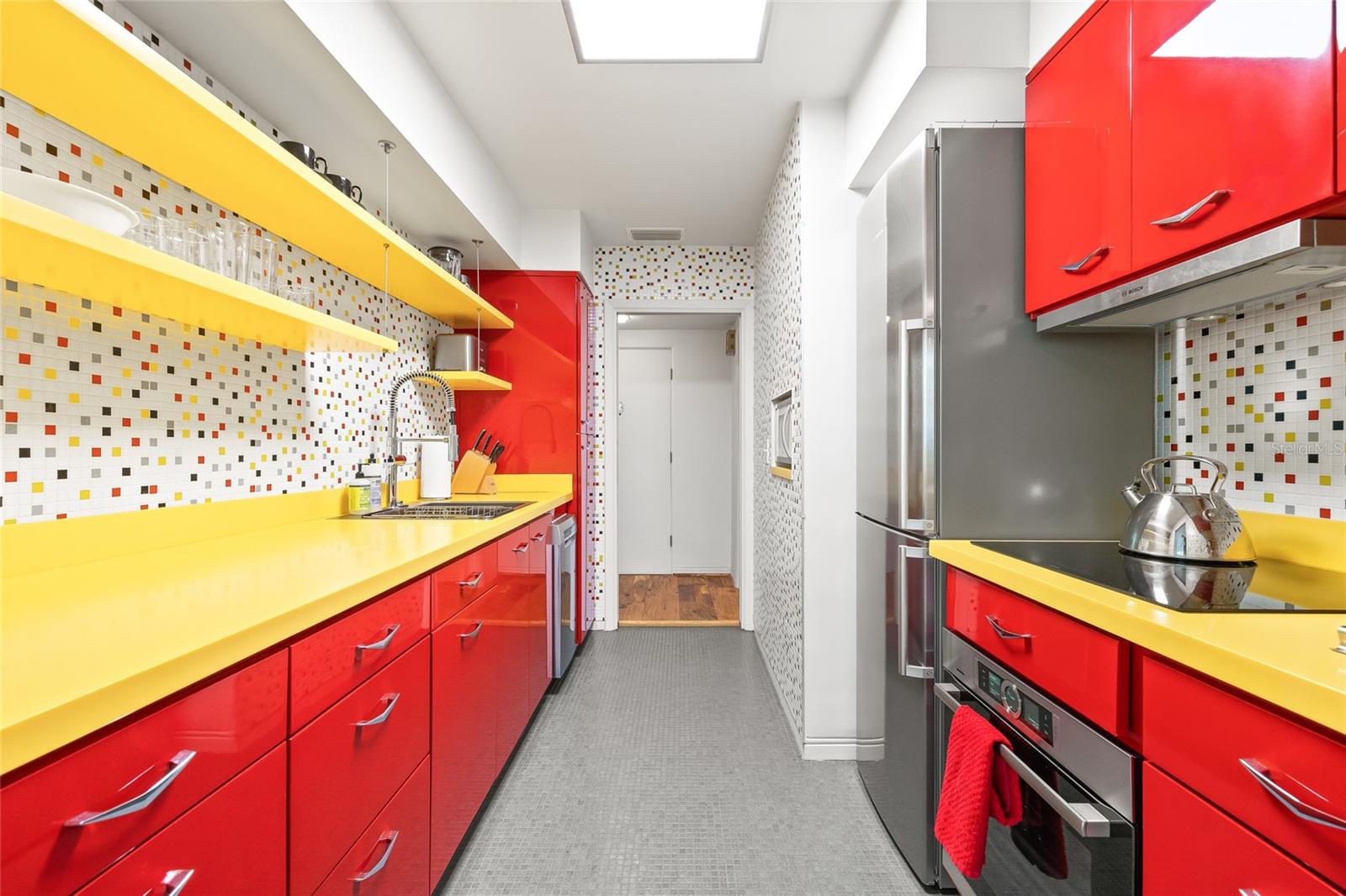The kitchen has been fully updated with new cabinets, and new appliances and plumbing.